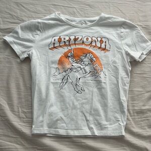 White and orange cropped shirt
